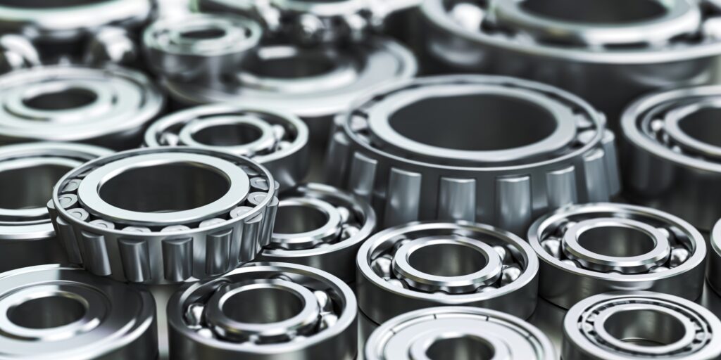 Ball and roller bearings of different sizes.