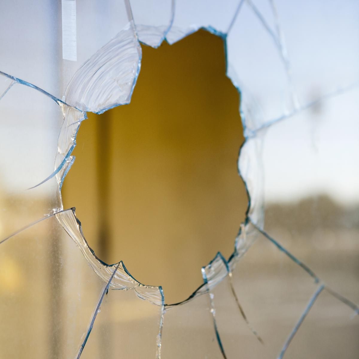 Broken glass, window pane, cracked glass pattern